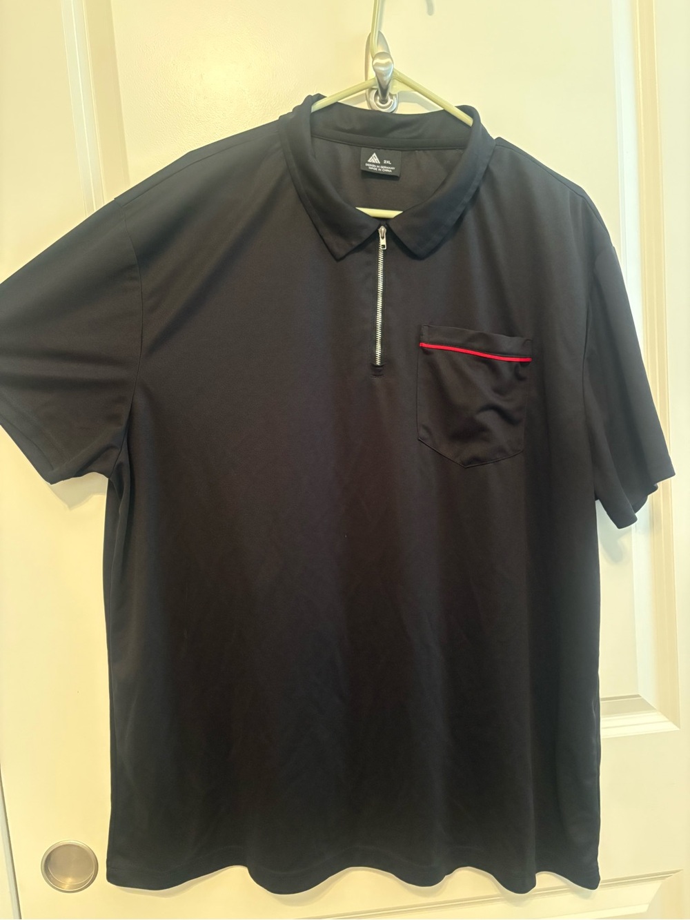 adidas Men’s Black Polo with Red-Trim Pocket and Zip Placket